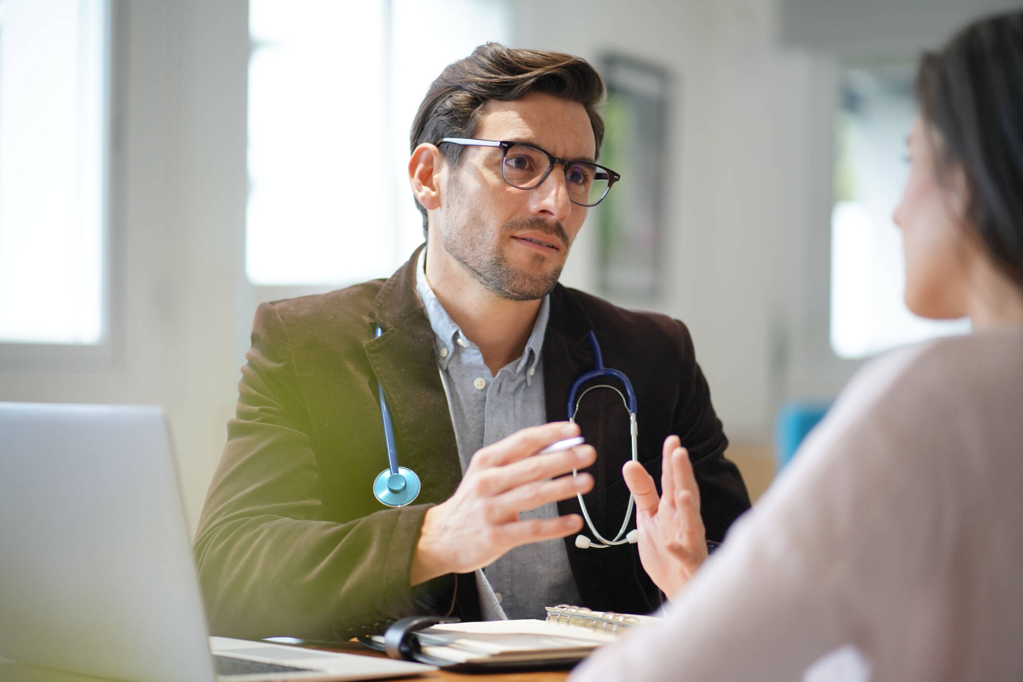 Private GP in a consultation